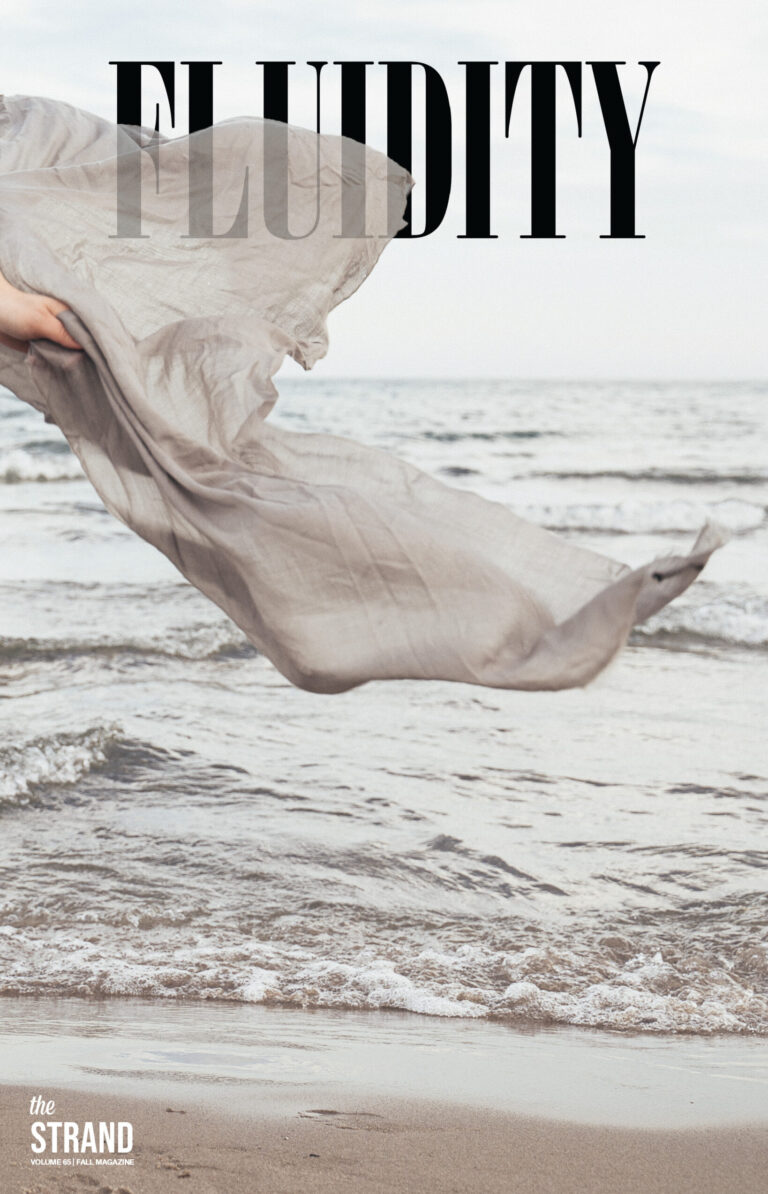 Cover of the magazine featuring person dancing while holding a sheet of sheer fabric
